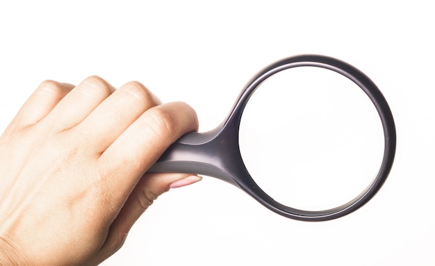 Hand Holding Magnifying Glass