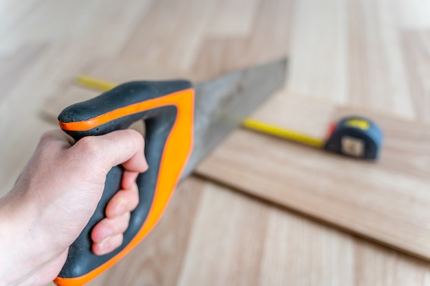 Preparing Laminate Board Measured, Laminate Flooring Hand Saw