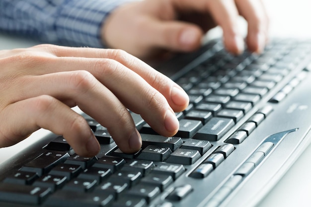 Premium Photo | Hand keyboard male laptop closeup human input