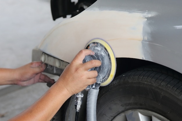 polishing a car by hand