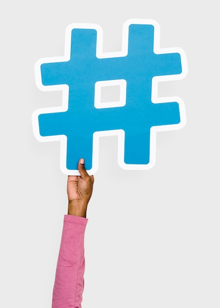  Hand  raised holding hashtag  icon Free Photo