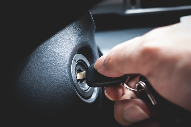 Premium Photo Hand Turning Car Key In The Key Hole To Start The Car