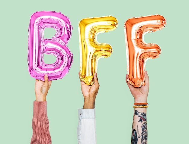 Premium Photo Hands Holding Bff Word In Balloon Letters