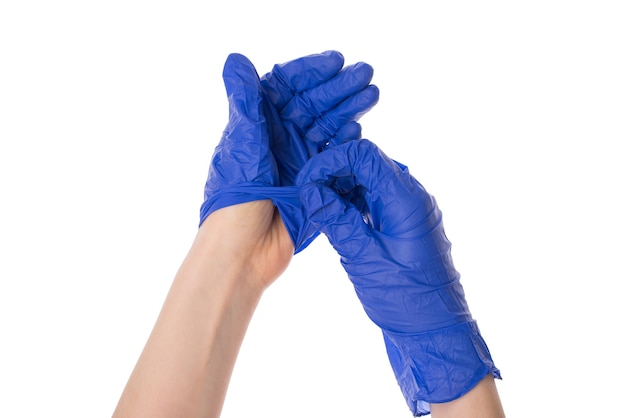 Premium Photo | Hands taking off her disposable protective gloves ...