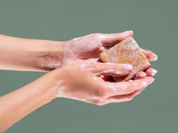 hands-washing-with-soap-bar-free-photo