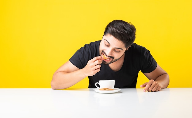 Premium Photo | Handsome bearded indian man eating healthy whole grain ...