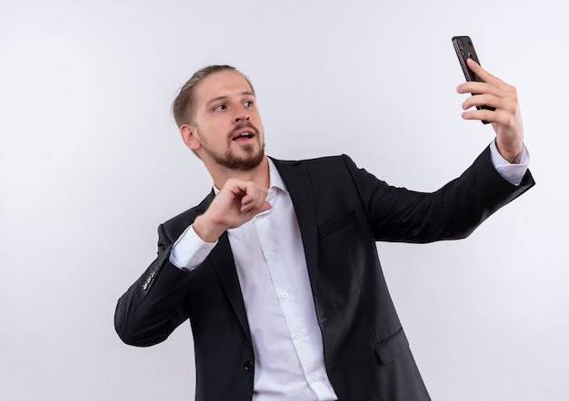 Free Photo Handsome Business Man Wearing Suit Holding Smartphone Taking Selfie Looking 0653