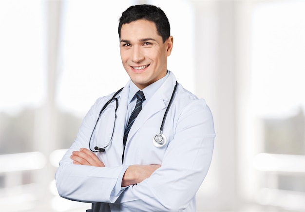 Premium Photo | Handsome doctor portrait on background