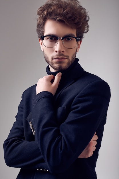 Premium Photo Handsome Elegant Man With Curly Hair Wearing Suit And Glasses