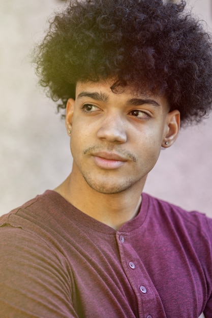 Handsome Guy With Afro Hairstyle On The Street Photo