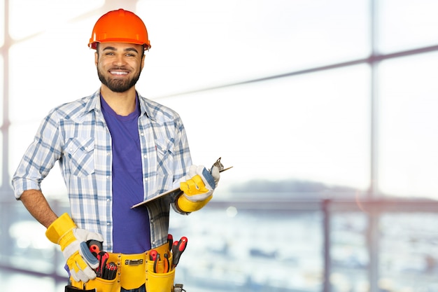 Premium Photo | Handsome happy workman