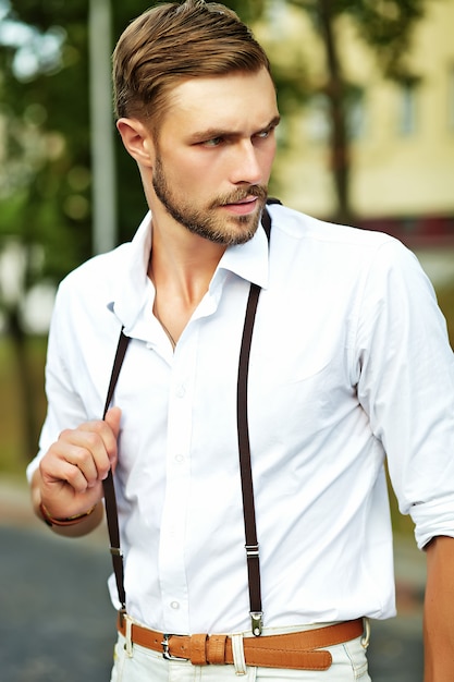 Free Photo | Handsome hipster model man in stylish summer clothes posing