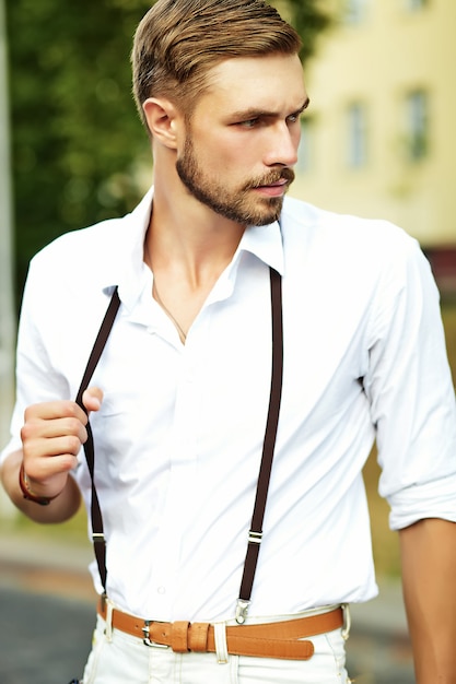 Free Photo | Handsome hipster model man in stylish summer clothes posing
