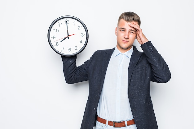 Free Photo | Handsome man in suite hold big clock in one hand isolated ...