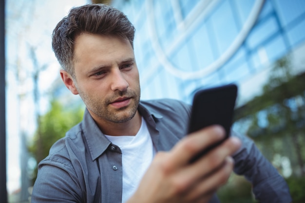 Premium Photo | Handsome man using mobile phone