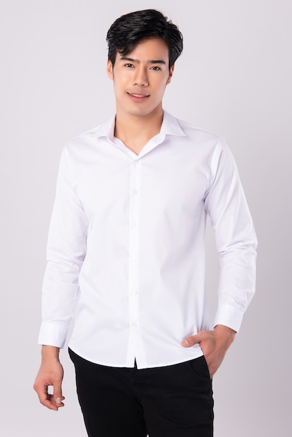 Premium Photo | Handsome man wearing a white shirt on white