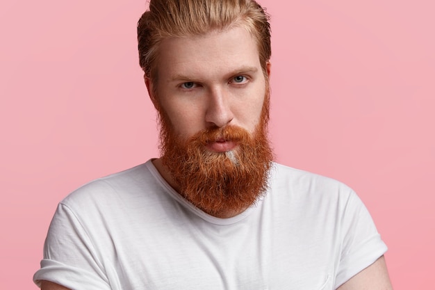 Free Photo Handsome Serious Businessman With Thick Ginger Beard Perfect Skin Looks Directly 7060