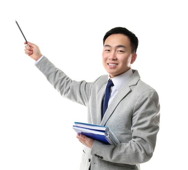 Premium Photo | Handsome young asian teacher on white background