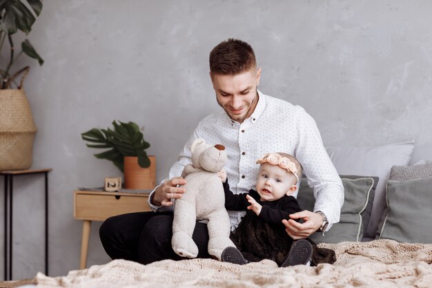 cute baby girl with father