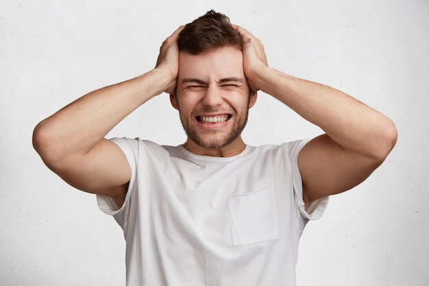 Free Photo | Handsome young man in white t-shirt