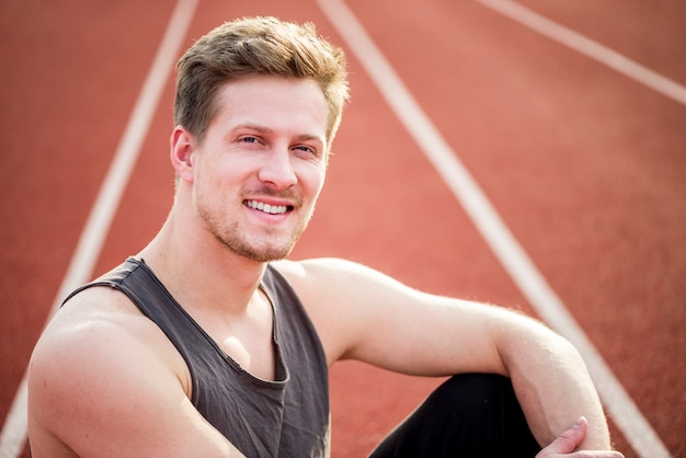 Free Photo | Handsome young runner looking at camera