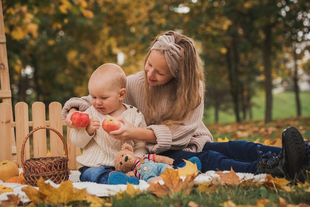 Mother And Baby Sitting On Blanket In Garden Stock Images Image 31837124