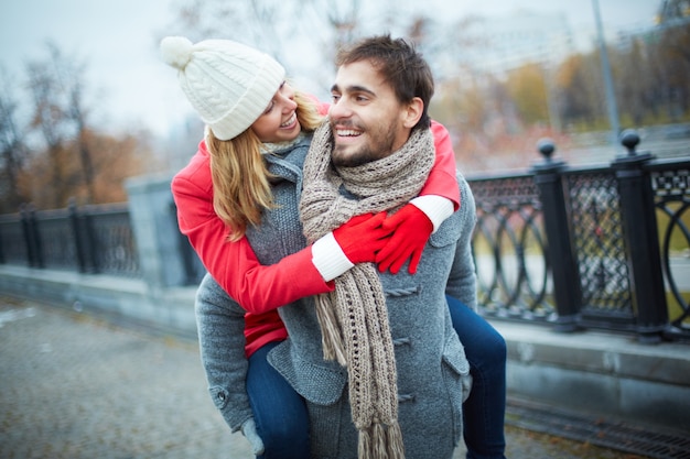 Happy couple piggybacking Free Photo Happy couple piggybacking Free Photo