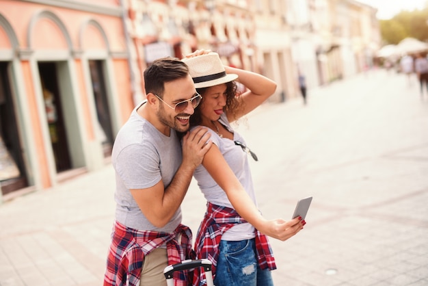 Premium Photo Happy Couple Taking Selfie On The Street On Summertime