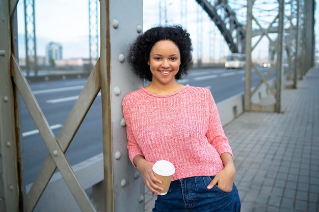 Premium Photo Happy Darkskinned Woman Walking In The City Smiling African American Lifestyle