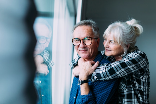 Happy elderly couple in retirement home Free Photo