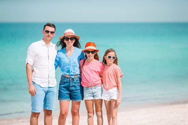 Premium Photo | Happy family on the beach during summer vacation