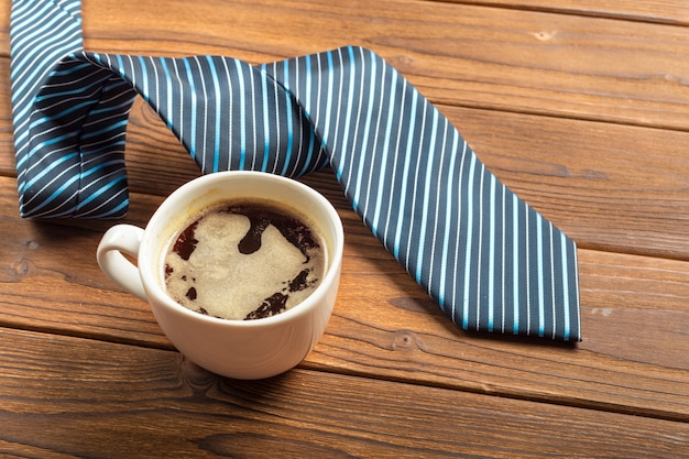 Happy father's day. tie on the wooden table Premium Photo