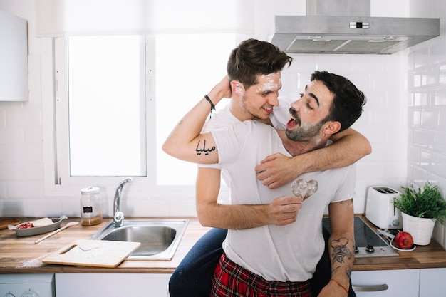 Free Photo Happy Gay Couple Having Fun In Kitchen