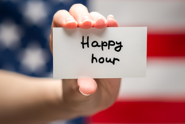 Premium Photo Happy Hour Text On A Card American Flag Background