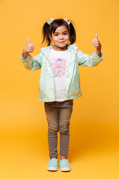 Free Photo | Happy little girl child standing isolated