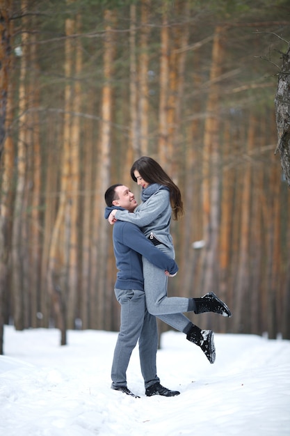 https://image.freepik.com/free-photo/happy-lovers-in-winter-on-background-of-snowy-forest-outdoors_370433-232.jpg