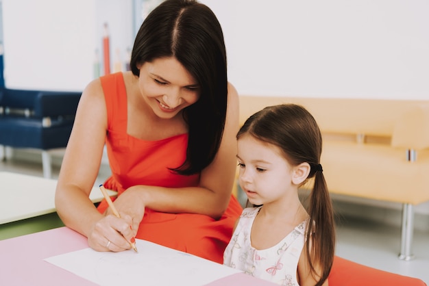 Premium Photo Happy Mother And Kid Have Fun At Pediatric Clinic