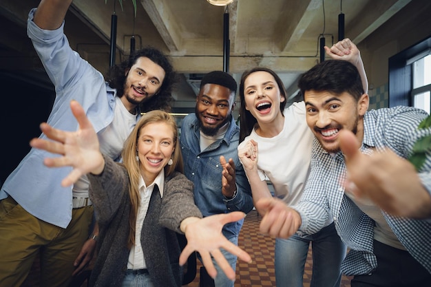 Premium Photo | Happy overjoyed business team celebrate corporate victory