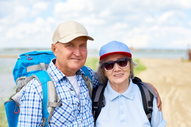 Premium Photo | Happy senior tourists posing