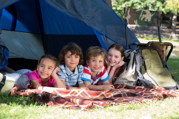 Premium Photo | Happy siblings on a camping trip