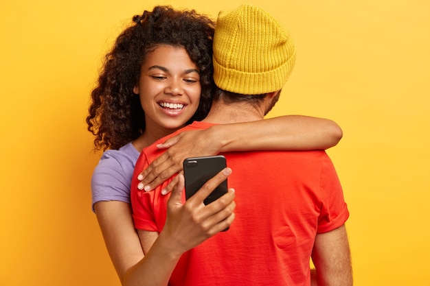 Free Photo Happy Smiling Afro American Woman Embraces Bo