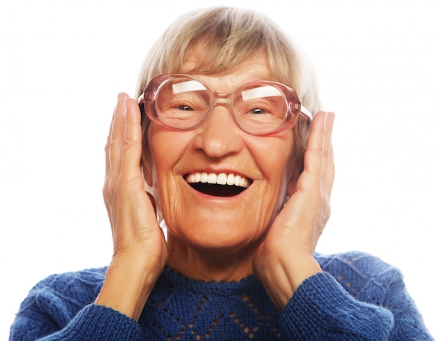 Premium Photo | Happy surprised senior woman looking at camera