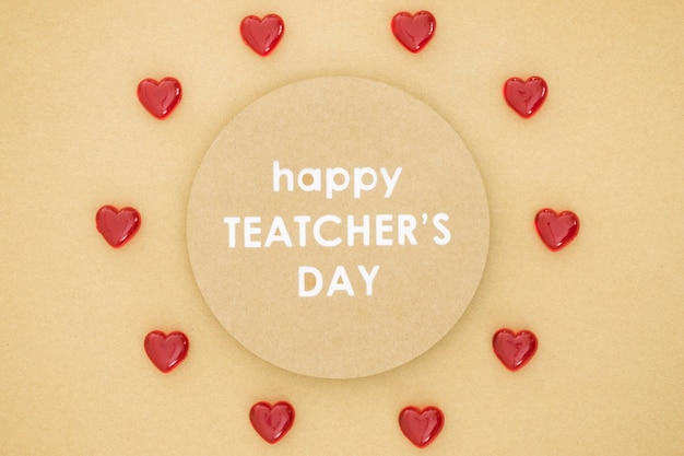 Premium Photo | Happy teacher's day in a circle surrounded by hearts