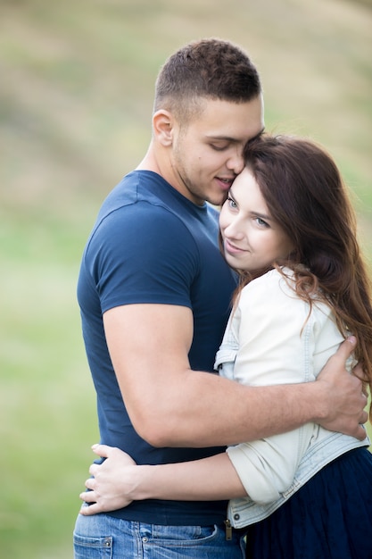 Free Photo Happy teenager hugging her boyfriend