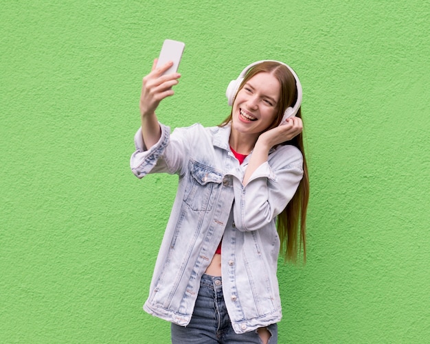 Free Photo Happy Woman Taking A Selfie