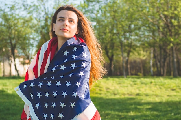 Premium Photo | Happy women with american flag usa celebrate 4th of july