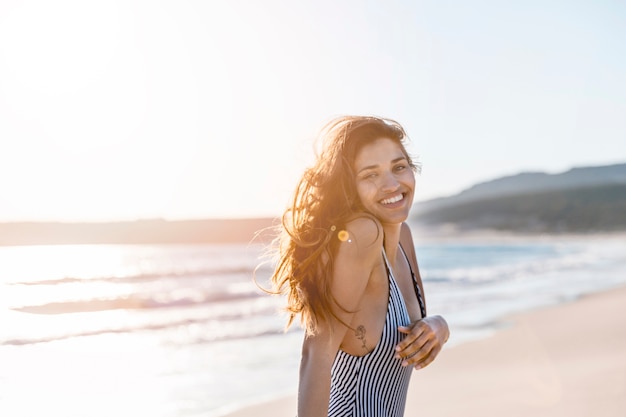 Free Photo | Happy young female in sunshine on tropical beach