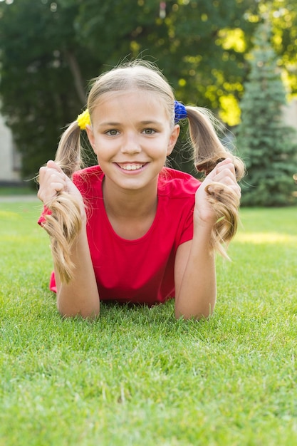 premium-photo-have-fun-girl-cute-kid-laying-green-grass-healthy