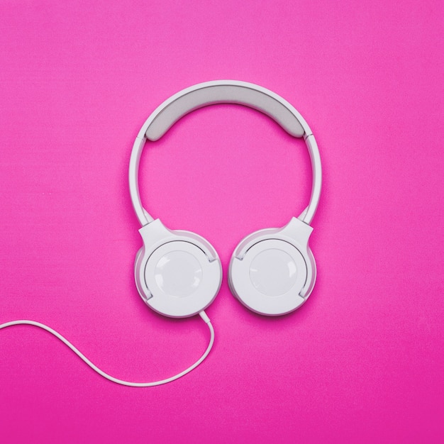 Headphones on bright background Photo | Free Download