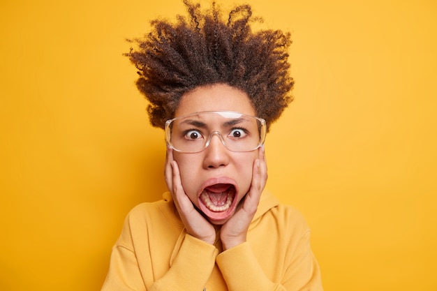 Premium Photo | Headshot of emotional super crazy startled curly woman ...